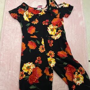 Pinc Black Jumpsuit with Vibrant Floral Design